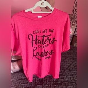 Cute fun sassy t shirt in a bold pink back ground.